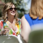 Mary Kathryn Wells, WC 2000, laughs with friends after Brenau University President Ed Schrader gave his toast during brunch at this year's Alumnae Reunion Weekend on Brenau's Gainesville campus.