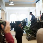 Christopher Carpenter leaves the stage after receiving his Bachelor of Business Administration.
