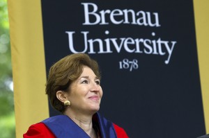 Brenau University commencement speaker Anne-Marie Slaughter smiles as University President Ed Schrader introduces her. Slaughter advised the graduating class to follow their hearts and "do what they want to do, not what they don't want to do."