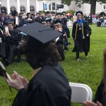 Bonnie Kin approaches the stage after she was awarded the Vulcan Teaching Award during the 2013 Women's College commencement ceremonies.