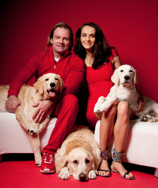 Antonina Lerch, her husband Michael and their 3 golden retrievers.