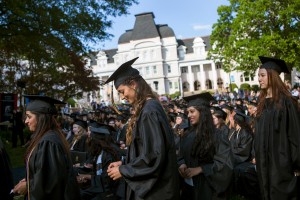 Dominika Jasova, center, walks to the podium during the 2015 Brenau Women's College Commencement. Jasova graduated with a Bachelor of Business Administration Degree.