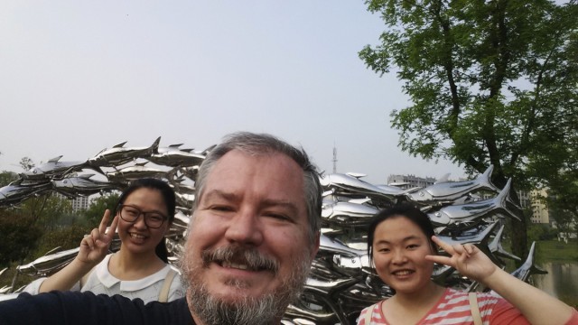 Sorohan visits Wuhu's Sculpture Park alongside two of his students.