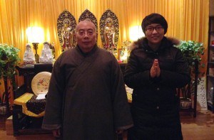 Autumn Zhao with the Abbot of the Buddhist temple she is helping to build near her hometown in China.