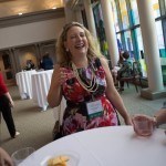 Susan Papesh, WC '06, laughs at the Wine & Cheese Opening Reception on Friday, April 15, 2016, in Gainesville, Ga. (AJ Reynolds/Brenau University)