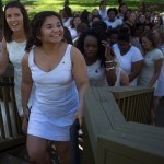 Nancy Benitez, a biology major, center, leads the junior class up the crow's nest be be crowned by seniors during the Brenau University Alumnae Reunion Weekend on Saturday, April 16, 2016, in Gainesville, Ga. (AJ Reynolds/Brenau University)