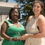 Kayla DelPizzo accepts the Young Alumna Award from Marsha Stringer, WC '96, BU '03, on behalf of her mother, Nicole Walker, at the Alumni Awards, Alumnae Reunion Weekend 2016.