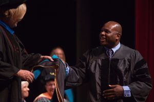 Dr. Allen Patmon is hooded for an Occupational Therapy Doctorate during the Brenau University College of Health Sciences Graduate Hooding Ceremony on Thursday, May 5, 2016. (AJ Reynolds/Brenau University)