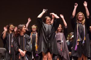 Students do the wave during the Brenau University School of Nursing Pinning Ceremony on Thursday, May 5, 2016 in Pearce Auditorium in Gainesville, Ga. (AJ Reynolds/Brenau University)