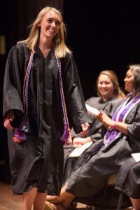 Kelley Reeves walks across the stage to receive an award during the Brenau University School of Nursing Pinning Ceremony on Thursday, May 5, 2016 in Pearce Auditorium in Gainesville, Ga. (AJ Reynolds/Brenau University)