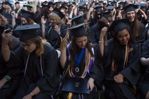 Graduates move their tassels after receiving their degrees during The Women's College Commencement on Friday, May 6, 2016, in Gainesville, Ga. (AJ Reynolds/Brenau University)