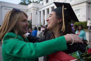 Women's College Dean Debra Dobkins, right hugs Tahimi Perez-Borroto, WC '16, after The Women's College commencement on Friday, May 6, 2016, in Gainesville, Ga. (AJ Reynolds/Brenau University)