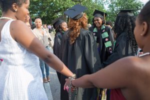 Austalia Beaufait, Kierra Herring, Jordan Pittman and Nichele Nibbs are serenaded by Alpha Kappa Alpha sisters after The Women's College commencement on Friday, May 6, 2016, in Gainesville, Ga. (AJ Reynolds/Brenau University)