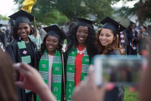 Jordan Pittman, from left, Kierra Herring, Nichele Nibbs and Austalia Beaufait, all members of Alpha Kappa Alpha, pose for photos during The Women's College commencement on Friday, May 6, 2016, in Gainesville, Ga. (AJ Reynolds/Brenau University)