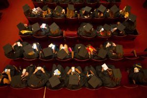 Graduates wait inside Pearce Auditorium before The Women's College commencement on Friday, May 6, 2016, in Gainesville, Ga. (AJ Reynolds/Brenau University)