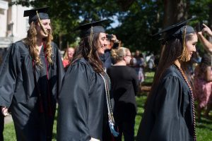 Valerie Rodriguez, from right, Tahimi Perez-Borroto and Olivia Varnson, all WC '16, take part in the Processional during The Women's College commencement on Friday, May 6, 2016, in Gainesville, Ga. (AJ Reynolds/Brenau University)