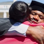 Allen Patmon hugs his girlfriend Kisha Knight after receiving his Occupational Therapy Doctorate during the Brenau University Undergraduate and Graduate Commencement on Saturday, May 7, 2016, in Gainesville, Ga. (AJ Reynolds/Brenau University)