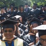 Candidates stand to be conferred their bachelors degrees during the Brenau University Undergraduate and Graduate Commencement on Saturday, May 7, 2016, in Gainesville, Ga. (AJ Reynolds/Brenau University)