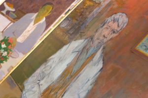 'Man at a Table' by Robert LaHotan, left, and 'Self Portrait' by Joseph Heliker. (AJ Reynolds/Brenau/University)