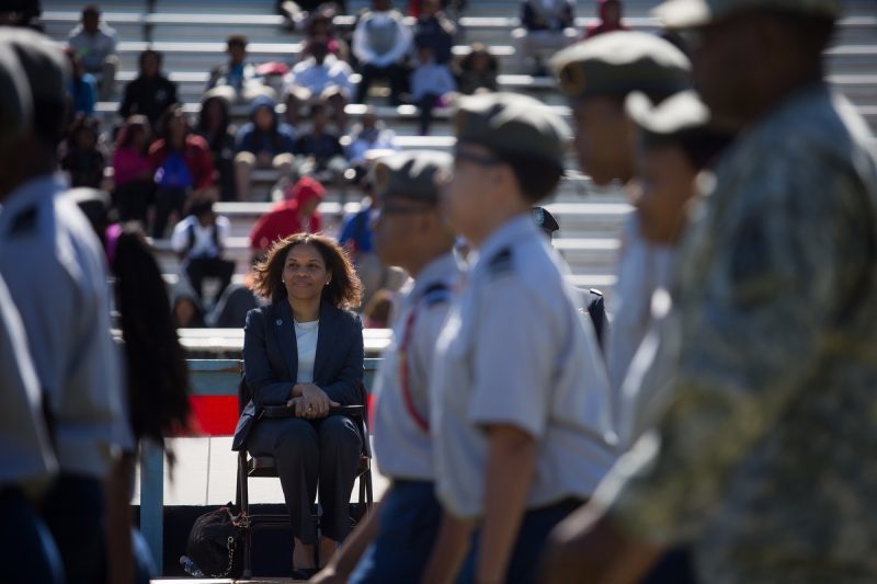 Castlin-Gacutan watches as JROTC students march past during a pass in review ceremony Friday, April 8, 2016, in Birmingham, Ala. (AJ Reynolds/Brenau University)