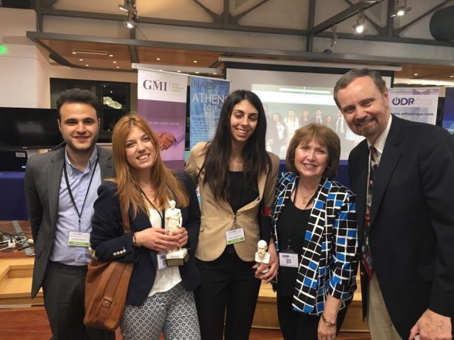 The winning mediation team from Greece posing with Mary Lou Frank, Ph.D., and Kenneth Frank. J.D. from Brenau University who earlier trained this group of students.