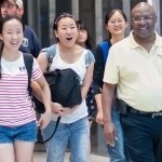From left, Crystal Wang, Cathy Wu, Daisy Qiu and College of Education Dean Eugene Williams walk into the arrivals area at Hartsfield-Jackson International Airport in Atlanta. (AJ Reynolds/Brenau University)
