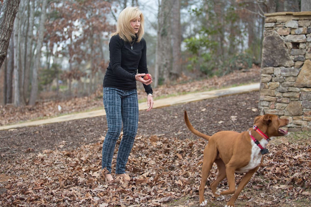 Brenau Trustee Amy Whitley with her dog. (AJ Reynolds/Brenau University)
