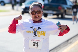 Arianna Escobedo poses for a photo while running during the Dempsey Dash 5K, a race celebrating the memory of Brenau's longtime Executive Vice President and CFO Wayne Dempsey, on Saturday, March 11, 2017. (AJ Reynolds/Brenau University)