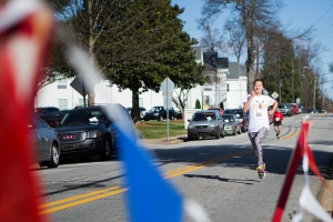 Xin 'Daisy' Qiu crosses the finish line during the Dempsey Dash 5K, a race celebrating the memory of Brenau's longtime Executive Vice President and CFO Wayne Dempsey, on Saturday, March 11, 2017. (AJ Reynolds/Brenau University)