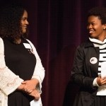 Sara Hubaishi, left, and Simone Lewis give a pair of welcomes for the 4th Annual Women's Leadership Colloquium on Friday, March 17, 2017. (AJ Reynolds/Brenau University)