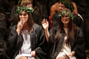 Graduating seniors Allie Smith and Kaitlyn Salters wave to audience members before Class Day during the 2017 Alumnae Reunion Weekend at Brenau University, Saturday, April 08, 2017. (Photo/ John Roark for Brenau University)
