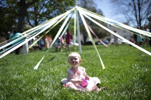 Emma Magness, 1, daughter of Sarah Magness, class '07, sits near the may day pole during the 2017 Alumnae Reunion Weekend at Brenau University, Saturday, April 08, 2017. (Photo/ John Roark for Brenau University)