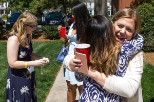Anna Claire Dover, WC '14, and Annie Johnston, WC '12, reunite at the Champagne Brunch. (AJ Reynolds/Brenau University)