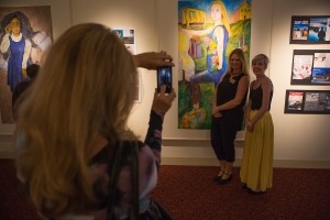 Samantha Corey poses for a photo with Claudia Wilburn, associate professor of art & design, during the Juried Exhibition of the Brenau Collaborative Opening Reception. (AJ Reynolds/Brenau University)