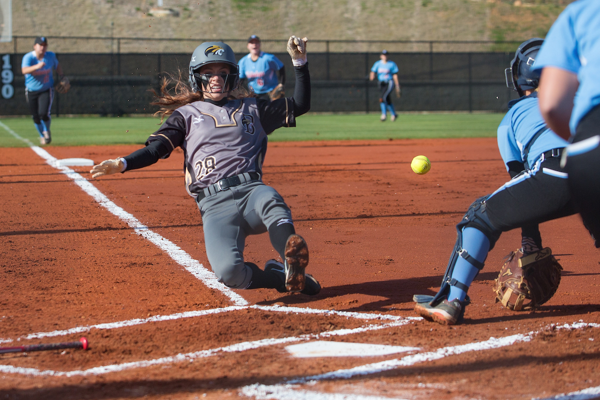 MacKenzie Oliver Mullis slides into home plate to score the first at Pacolet Milliken Field at the Ernest Ledford Grindle Athletics Complex between the Brenau Golden Tigers and Talladega College. (AJ Reynolds/Brenau University)