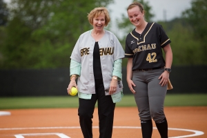 Kay Ivester smiles with Brenau pitcher Eli Daniel before throwing out the ceremonial first pitch during the celebration of the opening season of Pacolet Milliken Field at the Ernest Ledford Grindle Athletics Park, named for Kay Ivester's father. (AJ Reynolds/Brenau University)