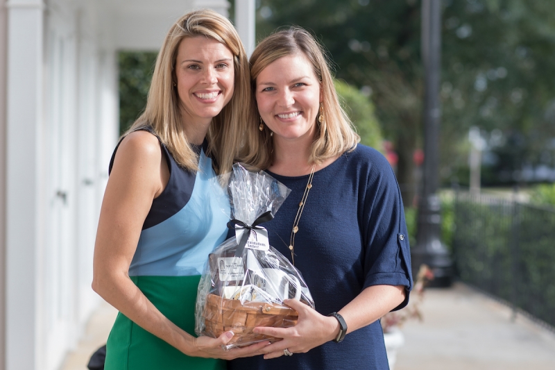 Brooke Bargeron Statham, WC '00, presents Amber Simmons, WC '03, with the Professional Achievement Award as part of the Alumni Awards during the homecoming celebrations at Brenau University. (AJ Reynolds/Brenau University)