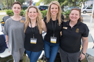 From left to right Jessi Shrout, Susan Papesh, WC '06, Brooke Bargeron Statham, WC '00, and Rosanne Short pose for a photo during the homecoming celebrations at Brenau University. (AJ Reynolds/Brenau University)