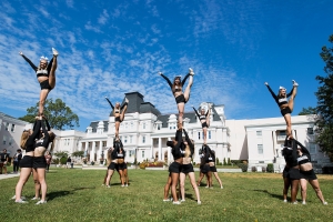 Brenau cheerleaders perform on the front lawn during the homecoming celebrations at Brenau University. (AJ Reynolds/Brenau University)