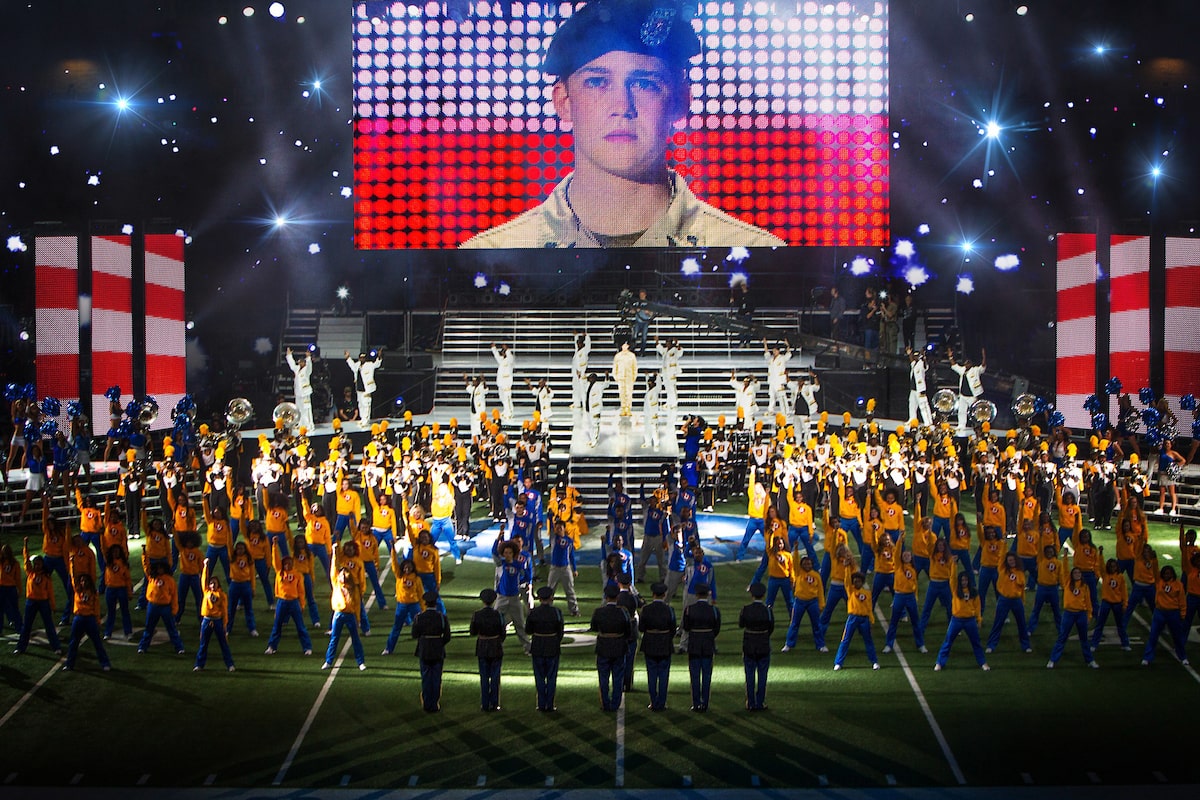 This image released by Sony Pictures shows Joe Alwyn, portraying Billy Lynn, on a screen in a scene from the film, "Billy Lynns Long Halftime Walk," in theaters on November 11. (Mary Cybulski/Sony-TriStar Pictures) © 2016 CTMG, Inc. All Rights Reserved. **ALL IMAGES ARE PROPERTY OF SONY PICTURES ENTERTAINMENT INC. FOR PROMOTIONAL USE ONLY. SALE, DUPLICATION OR TRANSFER OF THIS MATERIAL IS STRICTLY PROHIBITED.